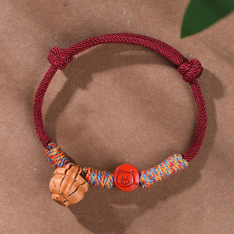 Buddhist Blessing Handmade Chinese Zodiac Red String Peach Pit Cinnabar Luck Bracelet