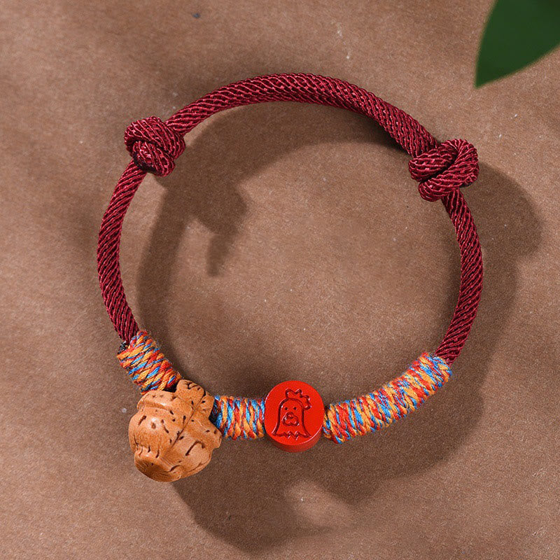 Buddhist Blessing Handmade Chinese Zodiac Red String Peach Pit Cinnabar Luck Bracelet