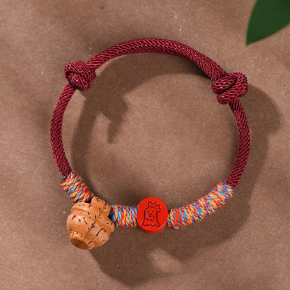 Buddhist Blessing Handmade Chinese Zodiac Red String Peach Pit Cinnabar Luck Bracelet