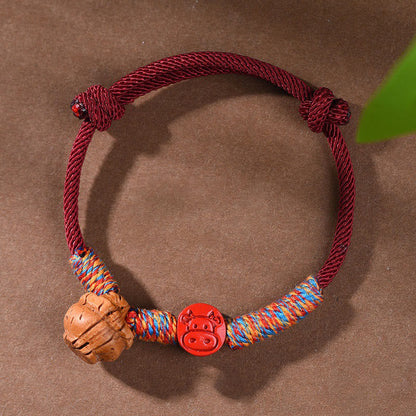 Buddhist Blessing Handmade Chinese Zodiac Red String Peach Pit Cinnabar Luck Bracelet