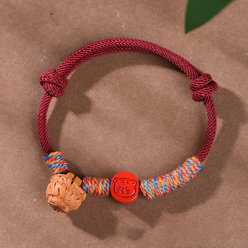 Buddhist Blessing Handmade Chinese Zodiac Red String Peach Pit Cinnabar Luck Bracelet