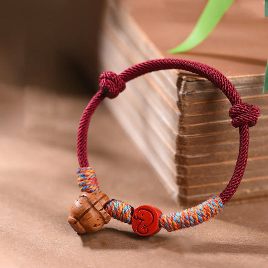 Buddhist Blessing Handmade Chinese Zodiac Red String Peach Pit Cinnabar Luck Bracelet