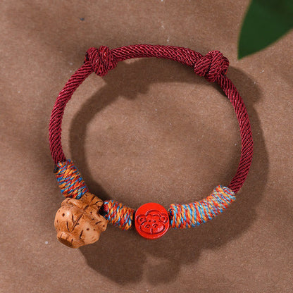 Buddhist Blessing Handmade Chinese Zodiac Red String Peach Pit Cinnabar Luck Bracelet