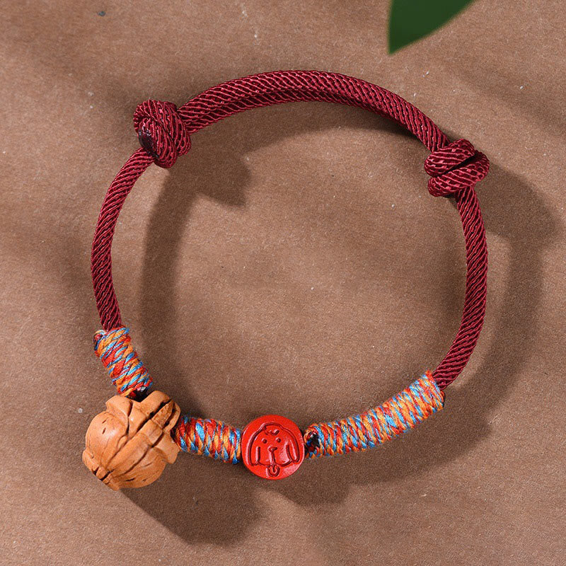 Buddhist Blessing Handmade Chinese Zodiac Red String Peach Pit Cinnabar Luck Bracelet