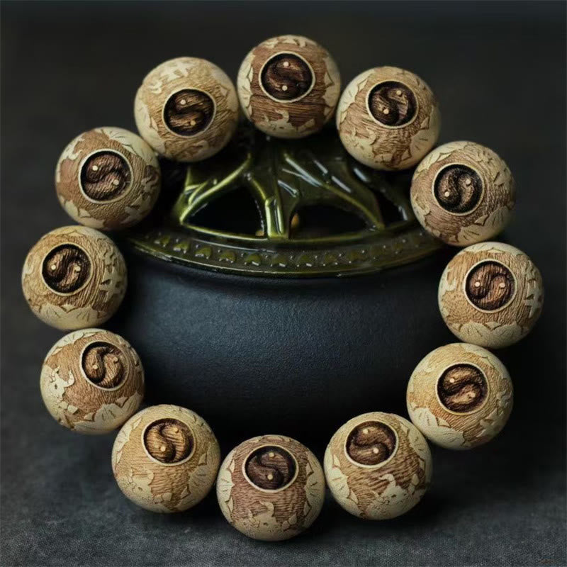 Buddhist Blessing Camphor Wood Yin Yang Ox Engraved Clarity Bracelet