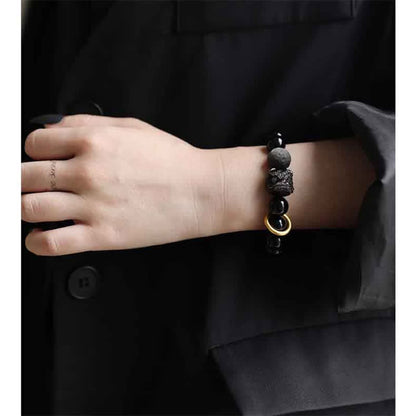 Buddhist Blessing Black Obsidian Silver Sheen Obsidian Lion Strength Bracelet