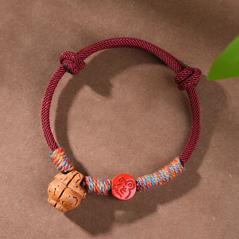 Buddhist Blessing Handmade Chinese Zodiac Red String Peach Pit Cinnabar Luck Bracelet