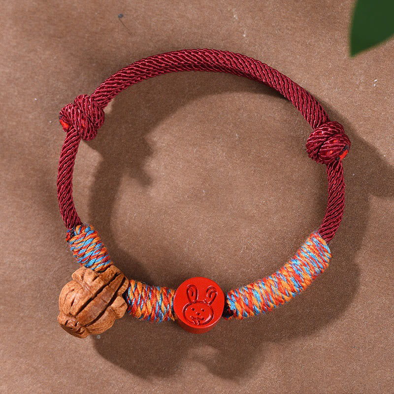 Buddhist Blessing Handmade Chinese Zodiac Red String Peach Pit Cinnabar Luck Bracelet