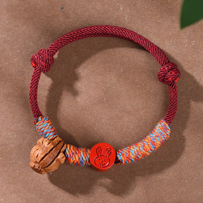 Buddhist Blessing Handmade Chinese Zodiac Red String Peach Pit Cinnabar Luck Bracelet