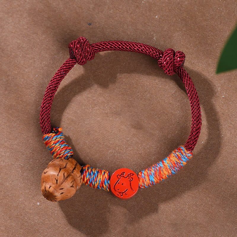 Buddhist Blessing Handmade Chinese Zodiac Red String Peach Pit Cinnabar Luck Bracelet