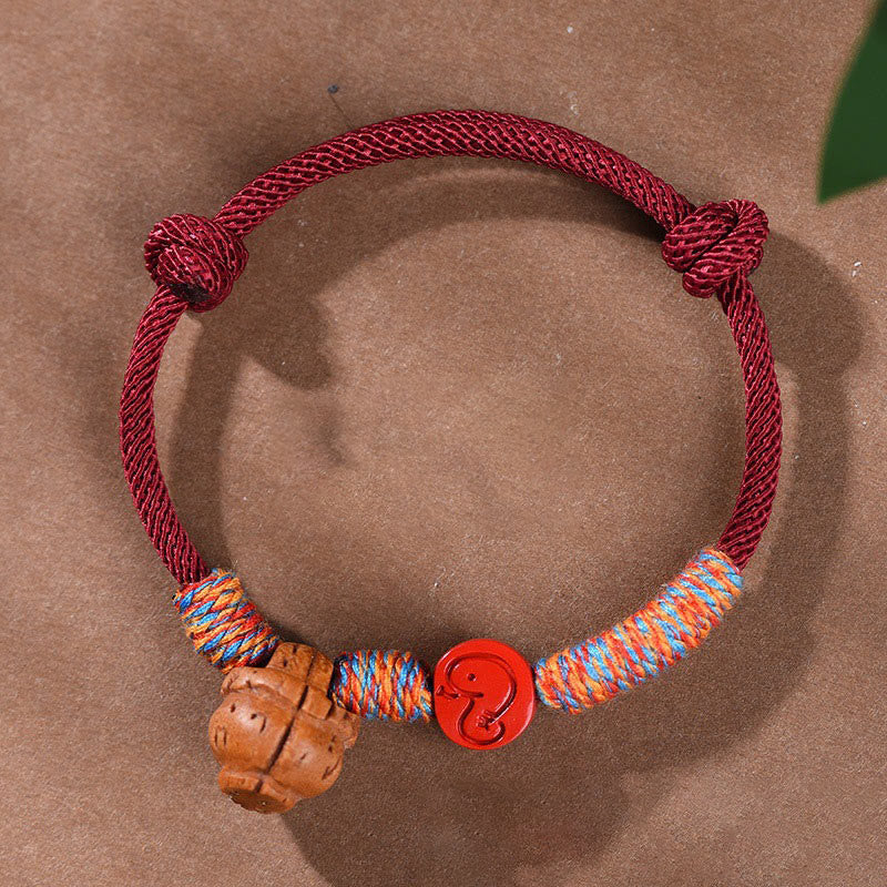 Buddhist Blessing Handmade Chinese Zodiac Red String Peach Pit Cinnabar Luck Bracelet