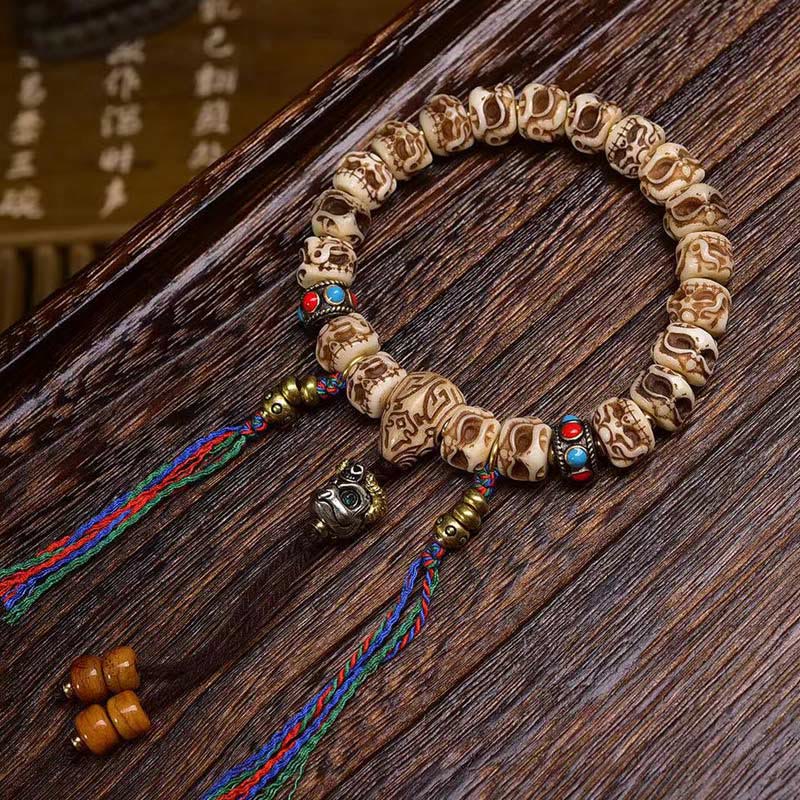 Buddhist Blessing Tibetan Camel Bone Garuda Carved Protection Tassel Bracelet